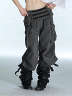 Victory jorts in grey from the Double Punch SS26 'Illusory Victory' collection. Flipped waistband design. Napoleon military jacket inspired double-breasted decorative buttons. Large side pockets. Baggy cargo shorts silhouette. Soft, comfortable 100% cotton fabric.